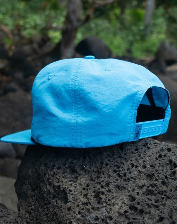 Hawaiian Monk Seal Hat. Made from quick dry recycled blue nylon. Perfect for outdoor adventures.