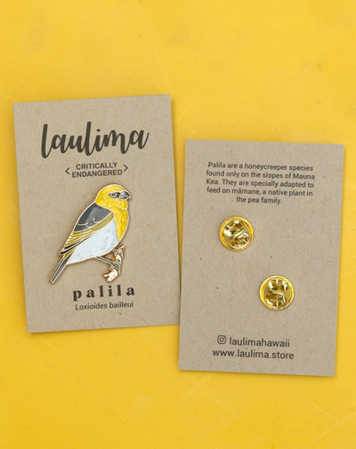 Palila Pin featuring the critically endangered Hawaiian honeycreeper that is found only on the slopes of Mauna Kea. Our gold enamel pins represent Hawaiian wildlife and advocate for their conservation.