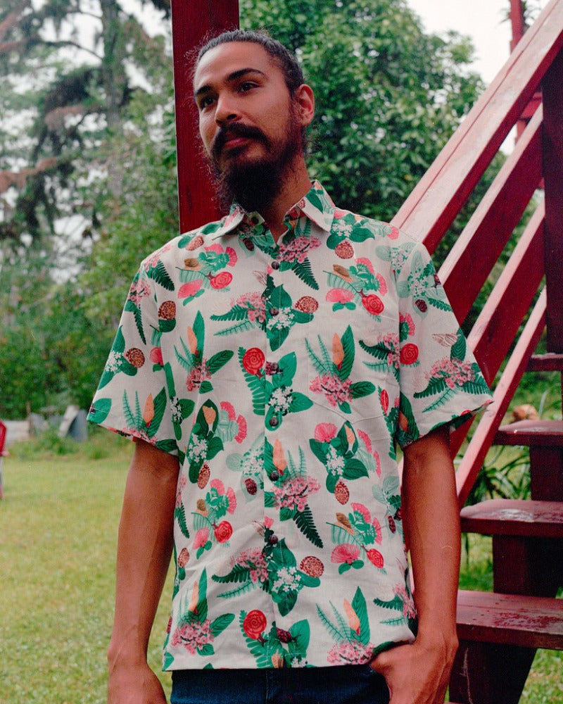 Kāhuli Aloha Shirt featuring native Hawaiian land snails. Button-down classic and colorful collar shirt made in Hawaii.