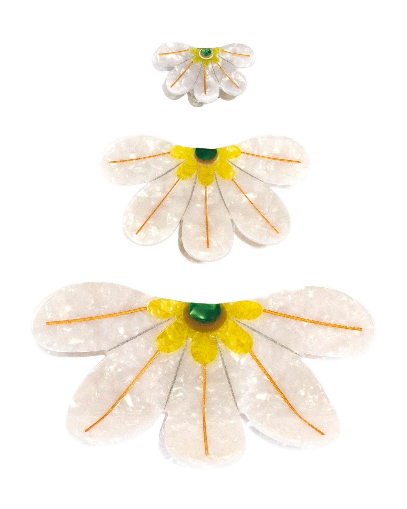 Three naupaka-shaped hair clips-- mini, medium, and extra large.